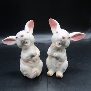 Two White Porcelain Rabbits